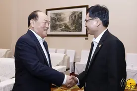 澳门特区行政长官贺一诚与广西壮族自治区主席蓝天立会面图片