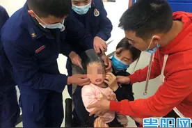 奶糖罐子卡住贵阳小朋友的头，消防叔叔10多分钟破罐解救小朋友图片