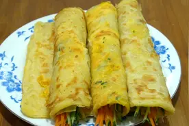 想吃鸡蛋灌饼不用出去买，老左手把手教你，每个都鼓泡，柔软多层图片