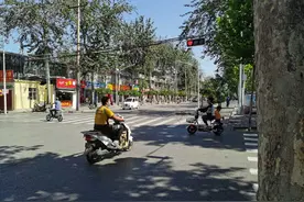 疲于奔命，不惜违反交通规则，外卖骑手何时才能不“职业性闯红灯”图片