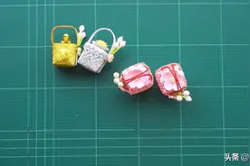 创意手工DIY，带你学习用彩带折叠袖珍花篮的方法！图片