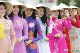 越南的奥黛，女孩标配，与中国旗袍，到底有多大的不同？图片
