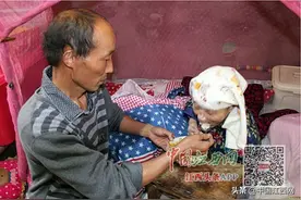 南昌新建区“65后”孝子照料瘫痪母亲32年图片
