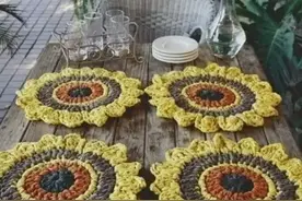 家里零线用粗线粗针钩织的杯垫，有着异域的风格，还实用图片