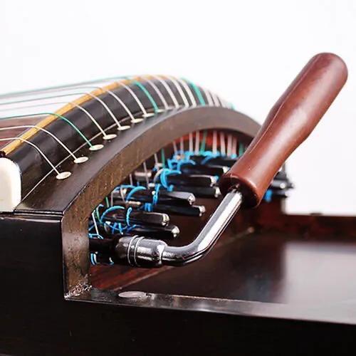 古筝的系弦与调弦,简谱表,五线谱表及定音器