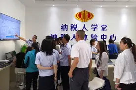 春风送暖花千树 便民办税利万家图片
