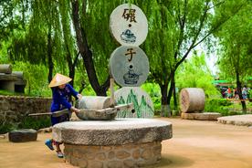 凝聚智慧的生产工具——碾子与磨盘图片