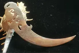 赏一日一器——西汉龙纹玉冲牙图片