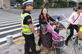 电动车禁用挡风被、遮阳伞，车主：那么好用，能别禁吗？获得回复图片