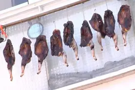 西班牙马德里华裔在自家窗台外晒腊肉被邻居报警图片