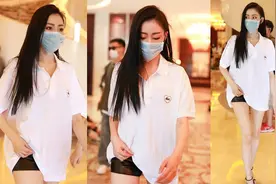 女星过机场的小动作，故意把衣服撩起一角，有多少网友看懂了图片