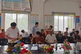 西峡丹水：流动“红黑旗”  推动“双脱贫”图片