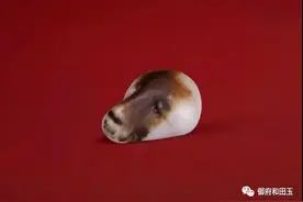 这个1100万的狗头玉，都说是鸡骨白图片