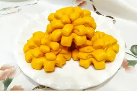 老南瓜上市的季节，简单的手法做金黄花卷馒头，这造型谁不喜欢图片