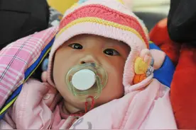 花钱买来孩子以后再“洗白”身份，挑战了国家法律的尊严秩序：打拐和健全收养制度应协同并进图片