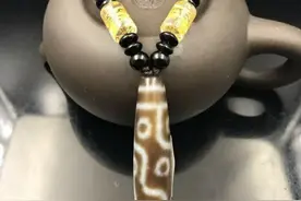 世上仅存的两串九眼天珠，有钱难买，一颗李连杰戴，今价值多少？图片