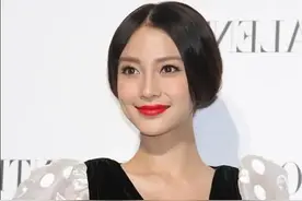 Angelababy杨颖换风格似换了个人。盘发红唇，端庄高贵图片