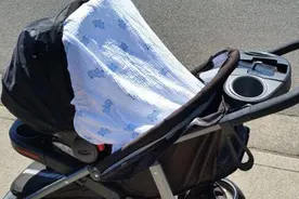 气温升高，还在婴儿车上罩这个东西？宝宝闷热难耐，有苦说不出图片