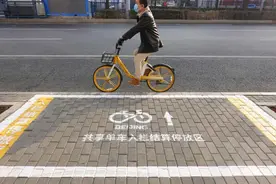 锁不上要被强制扣费，共享单车为什么越来越难停？图片