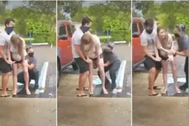 美国孕妇在医院露天停车场突然生下孩子后，抱着宝宝淡定走进医院图片