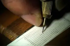 9.6厘米头发上雕刻382字！汕头艺人“针尖上的艺术”让人惊叹图片