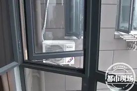 邻居空调安装到自家窗前，产生的热浪噪音恼人，女子苦不堪言图片