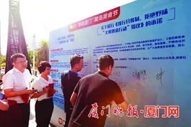 即便两人用餐 也要备好公筷公勺：厦门餐饮商家积极承诺推行分餐制，拒绝野味，弘扬文明餐桌图片