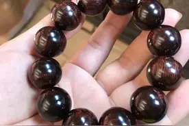 千年孕一木，爆满水波2.0，54.5克秒沉水级别，精选海南黄花梨图片