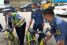 违规投放共享电动自行车，上路就查图片