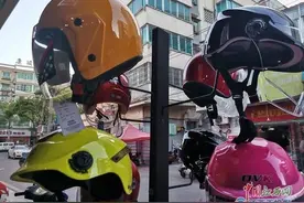 “一盔一带”引发头盔抢购热潮 九江商家：供不应求图片