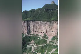 千米绝壁凿开“通天路”一锤一斧锻出“回龙精神”图片