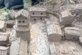 8岁男孩玩泥巴，玩出一个城池父母看傻，网友：孩子天赋不能小看图片