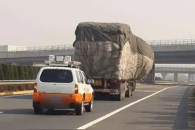 跟在货车后面闯红灯，会收到罚单吗？交警一句话点破答案图片
