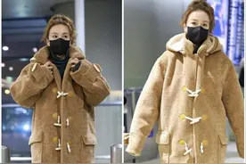 吴昕穿得挺显嫩，穿羊角扣绒大衣扮嫩成功，看着还挺可爱的图片