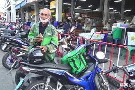 泰国七旬大爷不服老 疫期转行送外卖走红图片