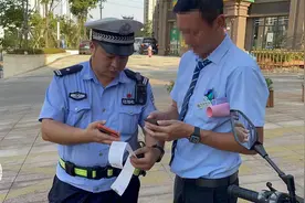 南昌：开出首张共享电动自行车违章处罚单图片