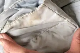 羽绒服脏了怎么办？不要再水洗！教你这样做，羽绒服洁净如新图片