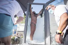 奥地利男子赤身裸体在冰块箱里呆两个半小时：通过意念战胜痛苦（图）图片