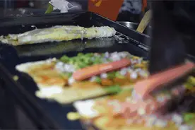 最好吃的街头小吃是谁？那必须是烤冷面图片