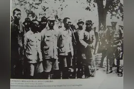 日寇酷刑，把人和狼狗一起关进地洞里图片