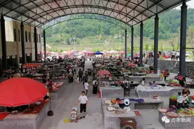 为了让当地农民告别“马路市场”宁波市海曙区在黔西南州贞丰县建了一个农产品交易中心​图片