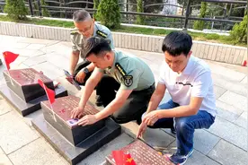 网络中国节•清明|辗转千里祭英烈 海南万宁军地合力为15位烈士墓碑嵌上彩色瓷像【视频】图片