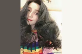 范冰冰大波浪卷发配红唇，明艳撩人图片