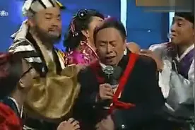 黄俊英粤语歌曲《1234567》一串数字让他唱出当时真实社会。