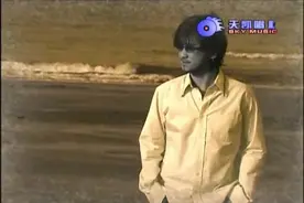 周传雄 - 《黄昏》依然记得从你口中 　　说出再见坚决如铁视频封面