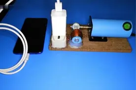 通过切割磁感线产生电能，从而为手机充电的自由能装置