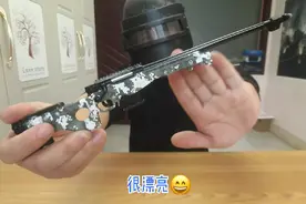 吃鸡绝地求生游戏AWM狙被削弱了，你们还喜欢吗?AWM小模型开箱视频封面