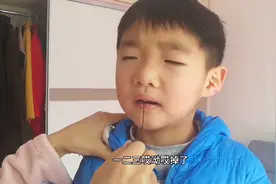 孩子换牙，妈妈从抖音学来的拔牙技巧正好用得上。