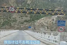 214国道和215国道金沙江大桥限高才2米，小伙绕路20多公里过限高视频封面