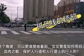 江苏连云港女交警站的地方很危险，你知道她为什么要站在这里吗？视频封面